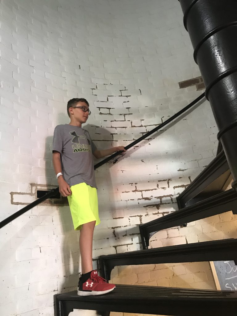 Lighthouse stairway holding railing