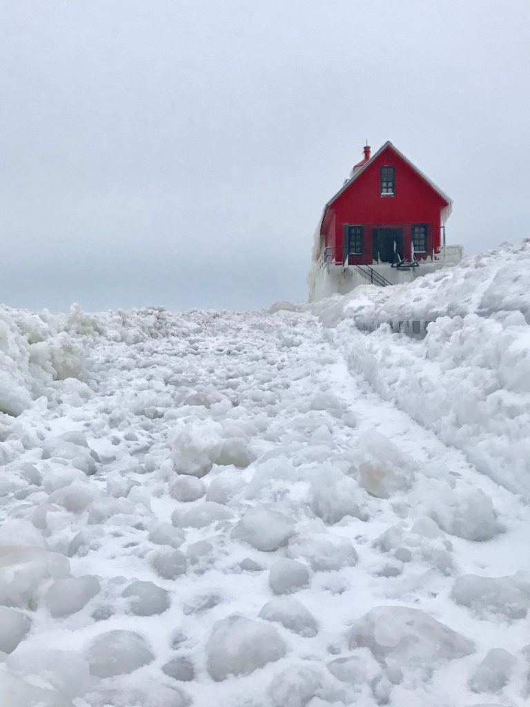 Grand Haven Pier and lighthouse. looking out to end of pier